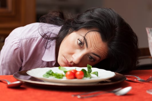 Woman looking at food