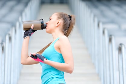 Girl drinking protein shake